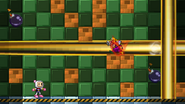 Wario being hit by the bomb's explosion with Bomberman standing under him.