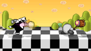 Kirby using Hammer near Wario, who is using his forward tilt on Mushroom Kingdom III.