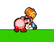 Kirby hitting Mario with Hammer on Test Stage 1.