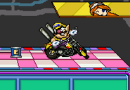 Wario turning around while an Energy Tank is next to him on WarioWare, Inc..