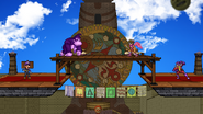 Luigi, Captain Falcon, Pit, and Donkey Kong standing idle on the stage.