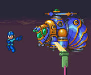 Mega Man using his back aerial near a Bee Blader.