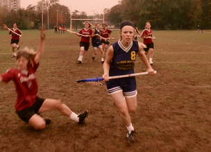 At the end Regina plays on the Lacrosse Team