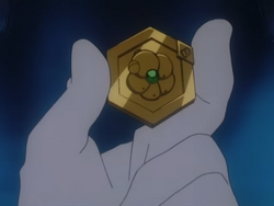 A Kabuto Medal in the anime