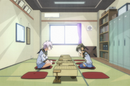 Natayama and Mochibaru play shogi.