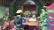 Zenkichi watering the flowers.