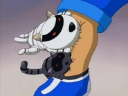 Two robots biting Dex's leg.