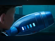 Rock's arm cannon, featuring a gauge that shows its charge shot level and two buttons of unknown function.