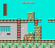 Mega Man approaching a lift-able block (indicated by the block flashing), while equipped with Super Arm.