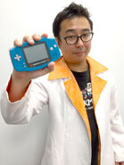 Eguchi with the Mega Man Battle Network 2 special edition Game Boy Advance.