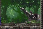 The cannon, as seen in the background of Web Spider's arena.