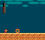 Mega Man firing Atomic Fire, fully charged.