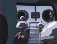 Small flying bombs resembling M-445 in the Mega Man animated series.