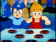 Normal OVA3 025.jpg (26 KB) Mega Man and Roll playing Whack-A-Mole at the festival.