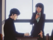 Yumiko greets Nakajima