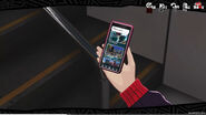 Aran checks Magatsushin on her phone
