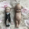 2 cute figurines US$45