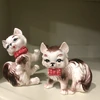 2 cute kitty figurines US$80