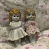 2 Vintage 1920’s bisque dolls US$120