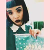 July 5, 2014: "I really love my clutch from @punceydesign 💕💕 Thank you @apryllrobertson 🎈🎈👑 It's so cute and brilliant 😻"