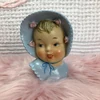 Tiny blue lady vase US$111