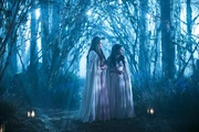 Freya and Ingrid fleeing their home dimension, Asgard.