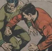 Scott kämpft mit McFarlane.