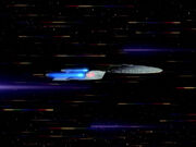 USS Enterprise going to warp in full profile
