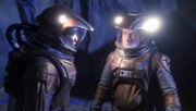 Travis Mayweather and Charles Tucker III on an asteroid