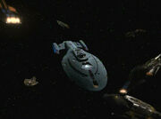 USS Voyager surrounded by Caatati ships