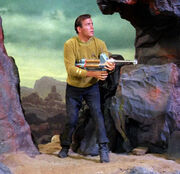 Kirk with phaser rifle