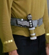 Gray laser pistol belt in 2265