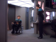 Bashir and Dax discussing Melora's wheelchair