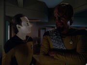 Data tries talking to Worf