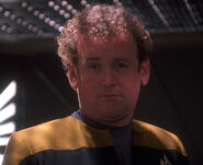 Chief Miles O'Brien in an operations gold uniform