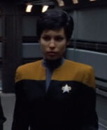 Passing Tuvok in a corridor