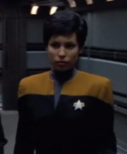 Passing Tuvok in a corridor