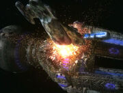 USS Voyager rams weapon ship
