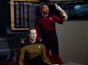 Riker removes Data's arm