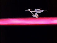 USS Enterprise leaving galactic barrier