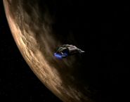 Runabout in orbit of barren moon-Ajilon Prime-Teplan homeworld-Koralis III
