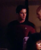 In a security meeting/Passing the transporter room Played by an unknown actor (TNG: "Lonely Among Us")