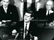 John F. Kennedy giving his "Decision to Go to the Moon" speech.