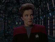 Janeway negotiates with the collective