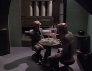 Nibor and Krayton crewman play chess