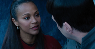 Uhura smiling at Spock