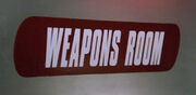 Weapons room sign