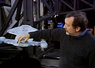 Intrepid-class studio model shuttlebay closed by Dan Curry.jpg (70 KB) Curry with the Voyager model
