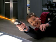 Tom Paris fires phaser