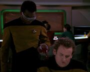 Geordi La Forge spilling drink on O'Brien